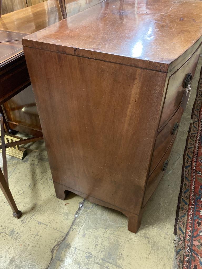 A Regency mahogany bow-fronted chest fitted three drawers, width 89cm, depth 51cm, height 86cm